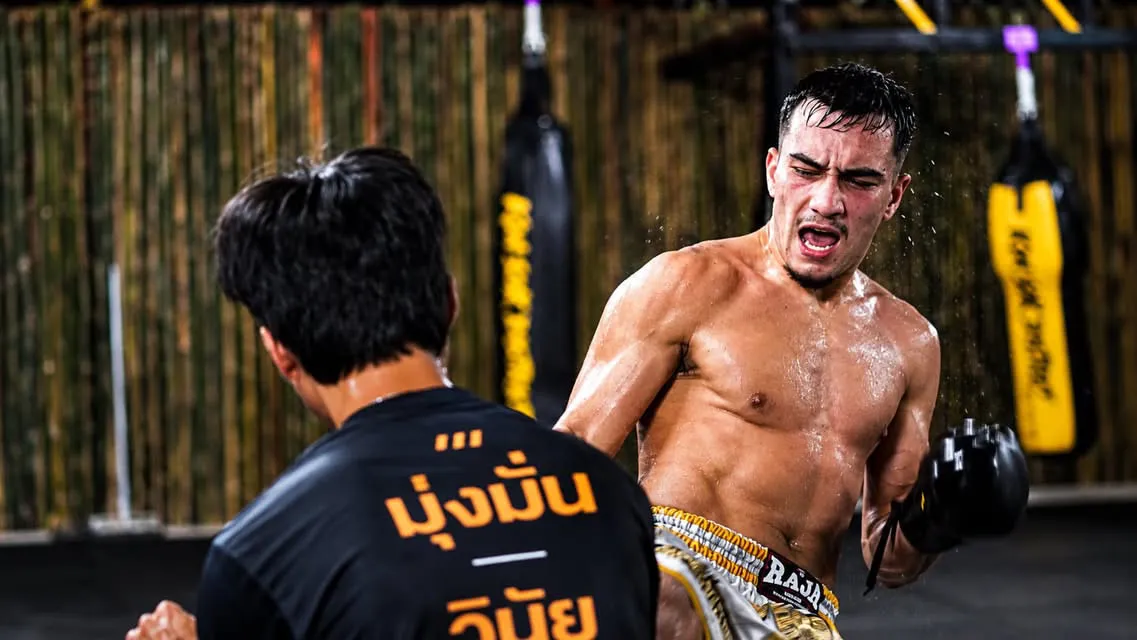 Pad work with a Thai coach at the camp – Kohsok District, Hua Hin