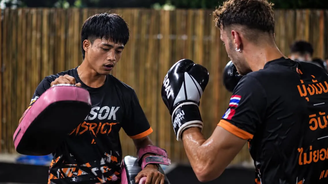Punching drills on the pads with a coach – Kohsok District, Hua Hin